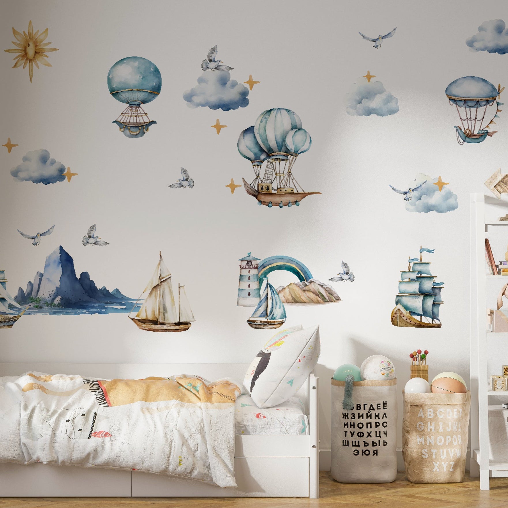 Nursery room adorned with our textile decals, featuring vintage ships and hot air balloons, creating a whimsical travel-themed ambiance.